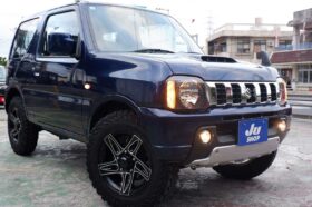 スズキ ジムニー 660 XG 4WD ビッグインテ―クの後期型ジムニー本土中古・アルミホイール・タイヤ・テールランプ・クラッツイオシートカバー
