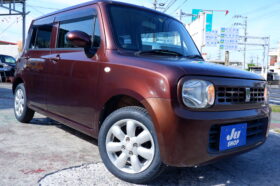 スズキ アルトラパン 660 G 本土仕入れ・修復なし評価3.5・新品タイヤ・純正アルミ・オプション新品アルミ・DVD・バックカメラ